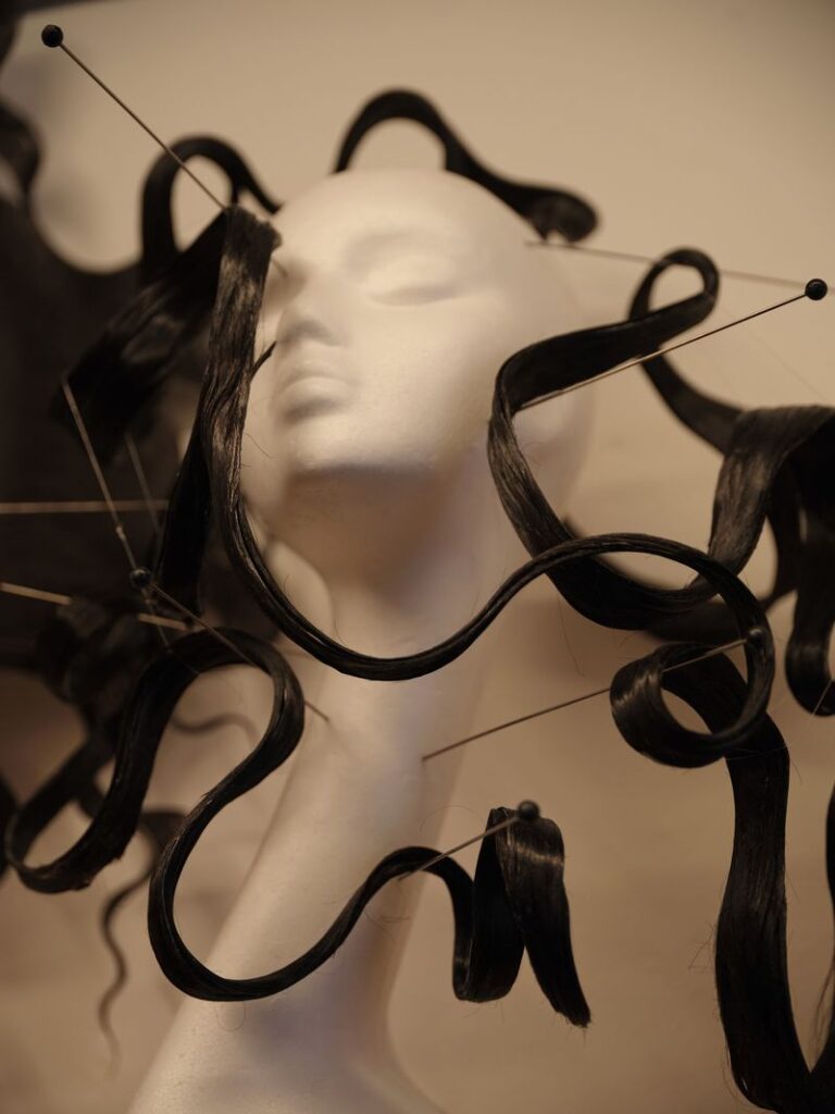 Part of the hairpiece the artist is working on.