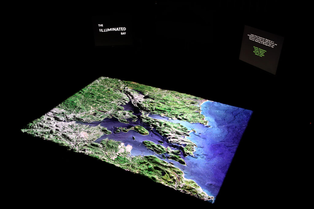 A platform that visualizes data that can track the effects of climate change, such as tides, temperature rise, and salinity changes, on the surface of the Rhode Island area through projection mapping on a 3D printed surface. © Georgia Rhodes