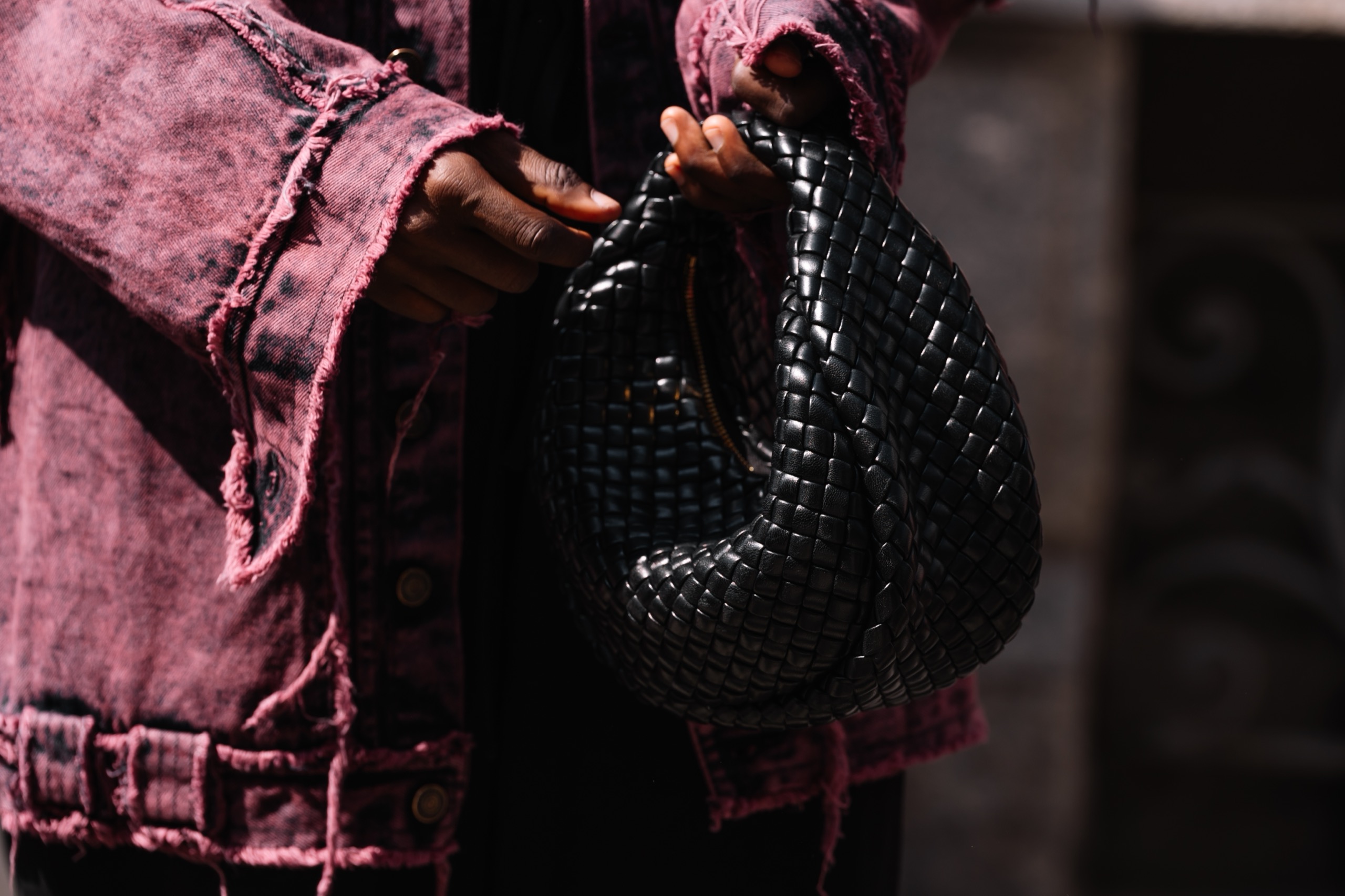 Bottega Veneta’s Intrecciato pattern, originating from a leather-weaving technique, extends beyond products into architectural surfaces, showing how heritage can be reinterpreted as a spatial design language.